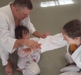 Children practicing the martial art of Aikido